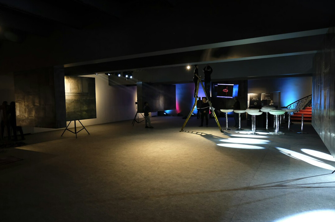 Television control room with multiple broadcast monitors